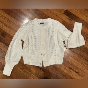 Woman’s White Cardigan